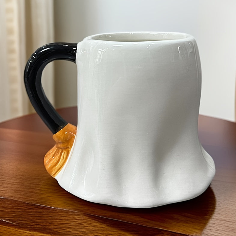 Halloweenmugg i Keramik med Spökdesign | Rund 280 ml Mugg med Spöke som Håller en Bok | För Varma och Kalla Drycker | Olsson