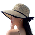 Floppy Hatt i Pappersstrå – Solhatt Med Rosett Och Blomdetalj