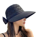 Floppy Hatt i Pappersstrå – Solhatt Med Rosett Och Blomdetalj