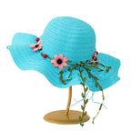 Stråhatt i Raffia – Solhatt Med Blommig Kant Och Band